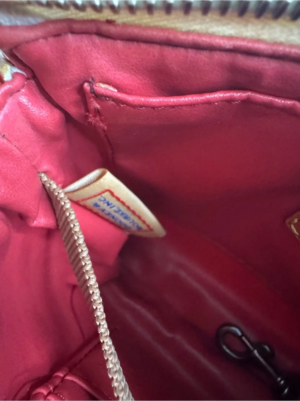 #380 Dooney & Bourke Lexi Small Pebbled Leather Crossbody Bag